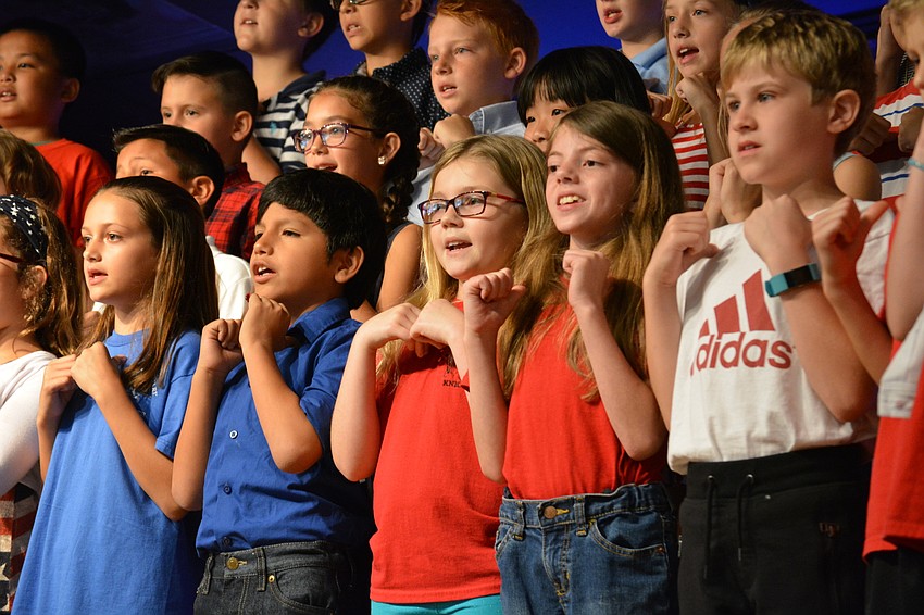 Students sign the song 