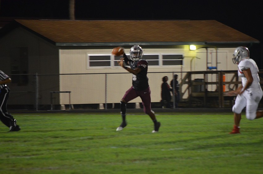 Riverview quarterback Arthur Brantley prepares to deliver a pass.