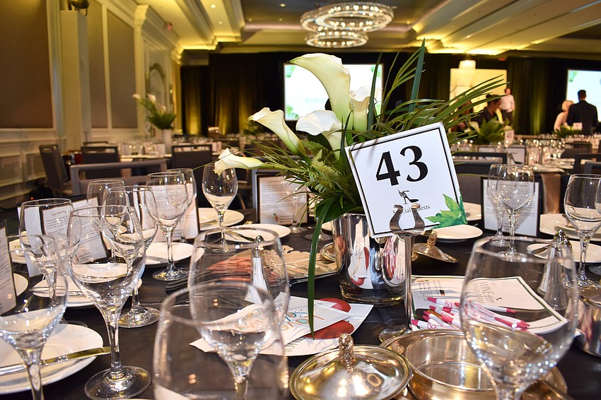 Every table was adorned with floral centerpieces at the luncheon.