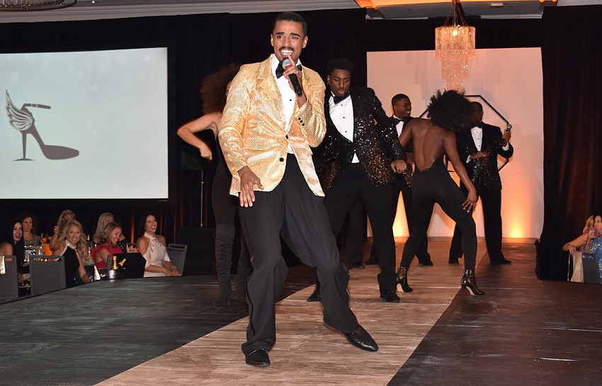 Michael Mendez performs in the program opener with several members of Westcoast Black Theatre Troupe.