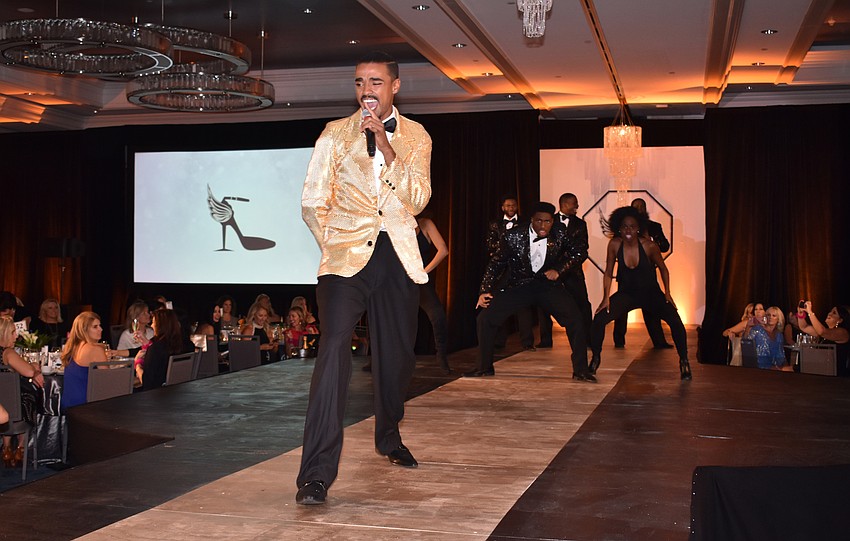 Michael Mendez performs in the program opener with several members of Westcoast Black Theatre Troupe.