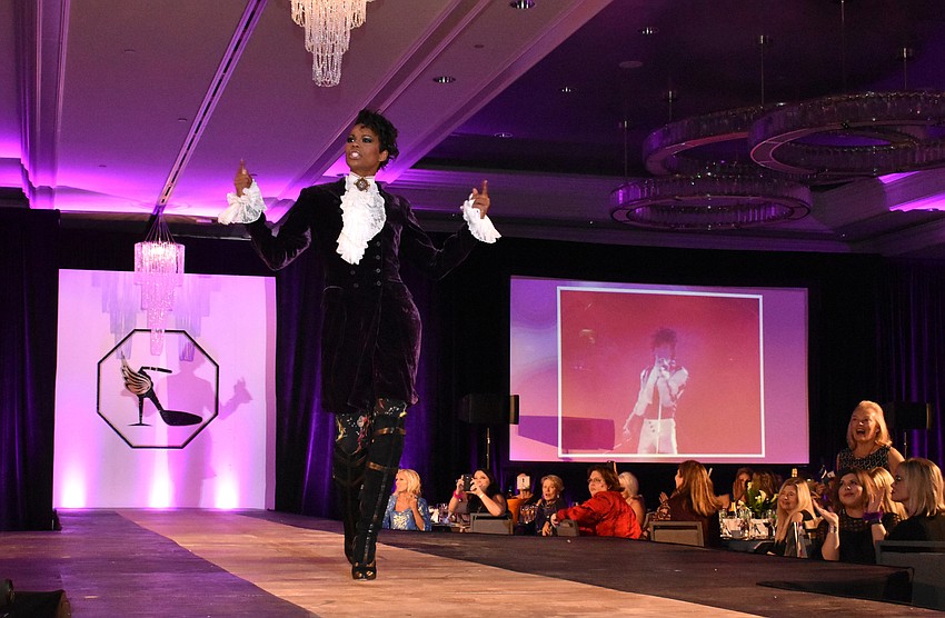 Models strut the runway during a lively fashion show by The Met.