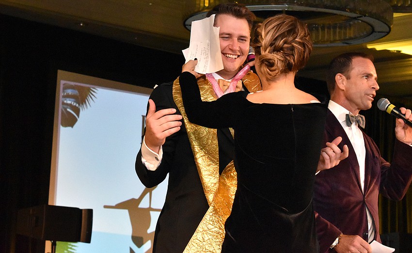 Bart Lowther is awarded King of Sole by Chairwoman Tina Granthon.