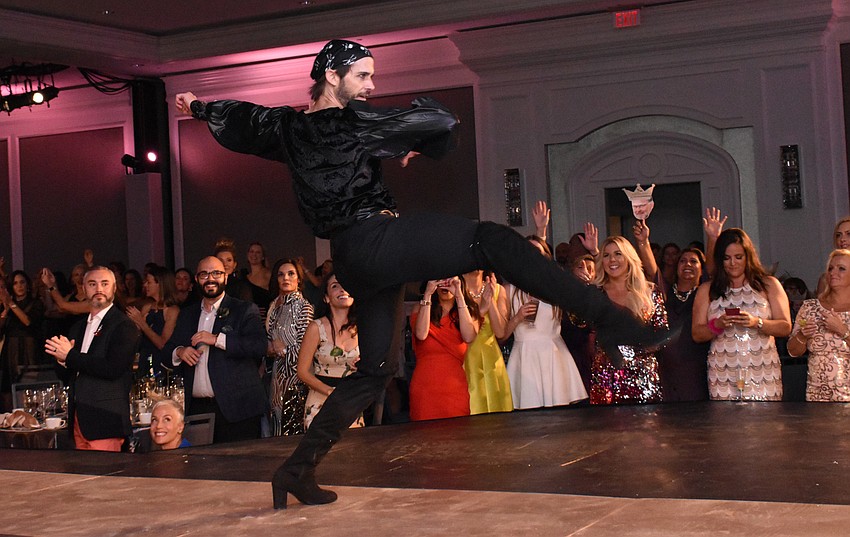 Chaz Glunk, manager and head instructor of Pure Barre Sarasota, performs in the closing number.