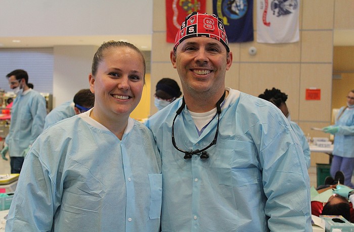 Dental assistant Ashley Cestero and Dr. Gregory Meadows of Meadows Family Dentistry performed dental extractions and fillings during this yearâ€™s Remote Area Medical at Manatee Technical College.