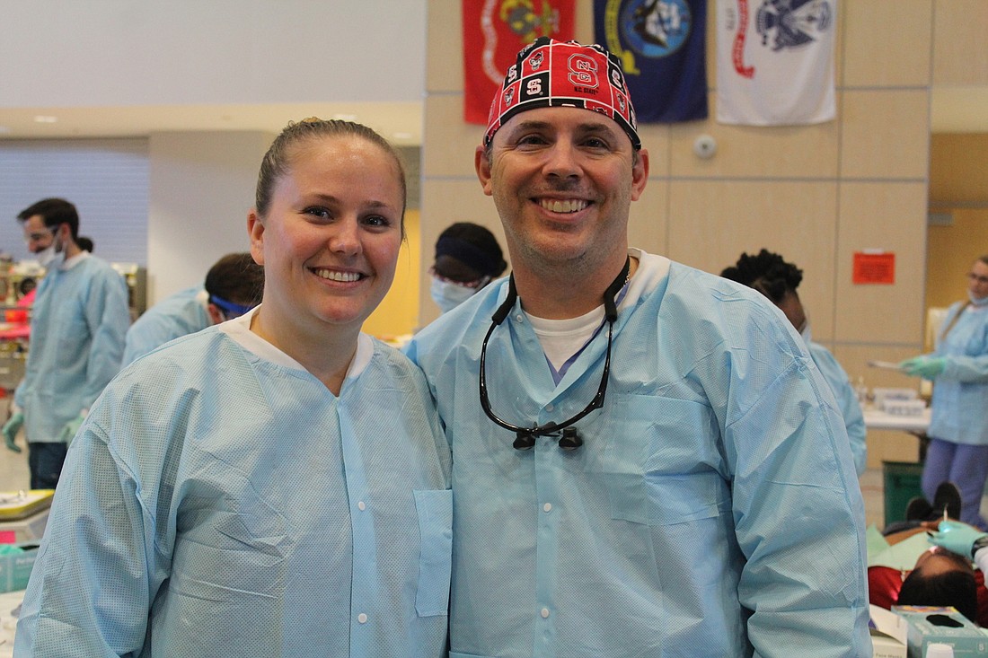 Dental assistant Ashley Cestero and Dr. Gregory Meadows of Meadows Family Dentistry performed dental extractions and fillings during this yearâ€™s Remote Area Medical at Manatee Technical College.