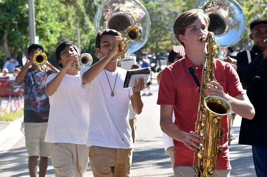 The Booker High School Marching Band performed throughout the parade route.