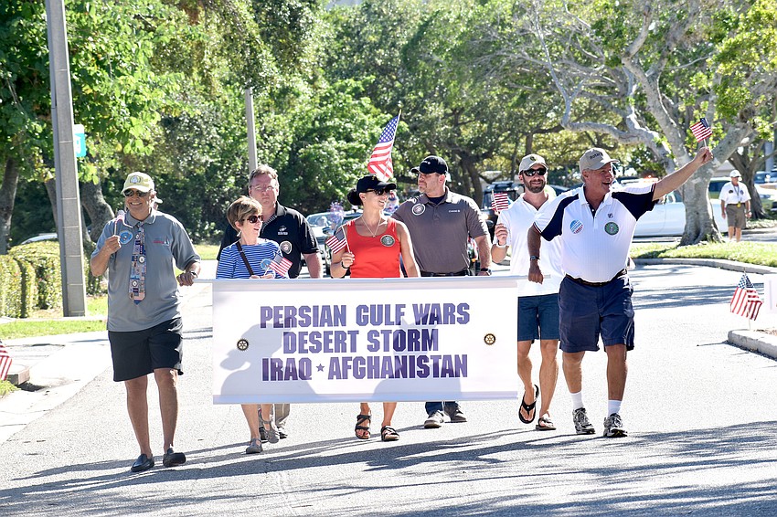 Veterans of the Persian Gulf Wars and Iraq and Afghanistan walk the parade route.