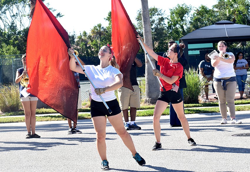 Flag twirlers from the Booker High School Marching Band, The Whirlwind Brigade,  performed during the fourth annual Longboat Key Veterans Day Parade.