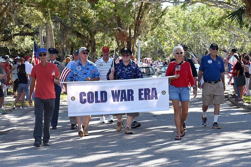 Cold War veterans make their way down the parade route.