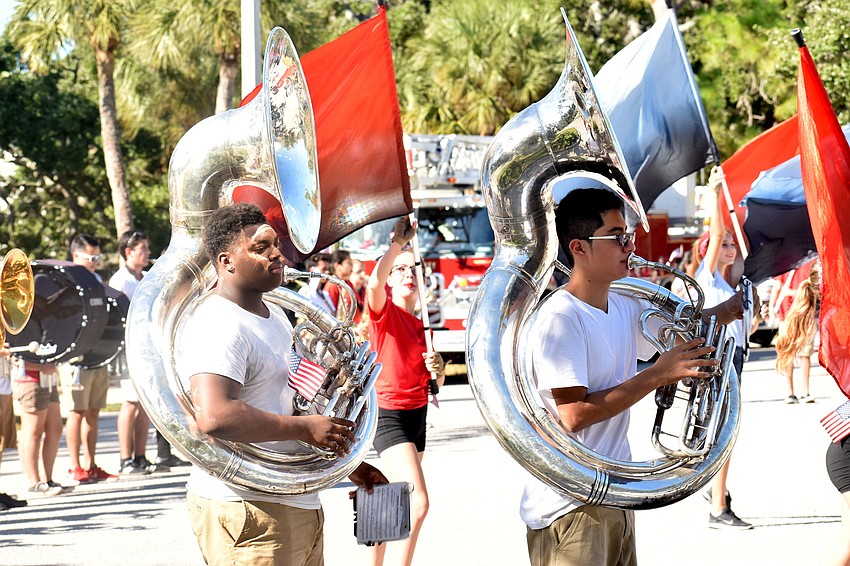 The Booker High School Marching Band performed throughout the parade route.