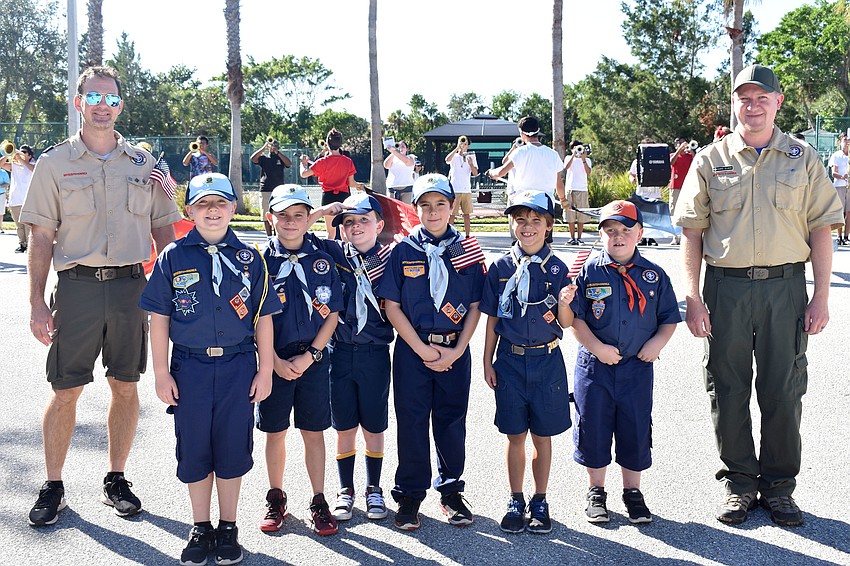 Boy Scouts handed out American flags to parade-goers.