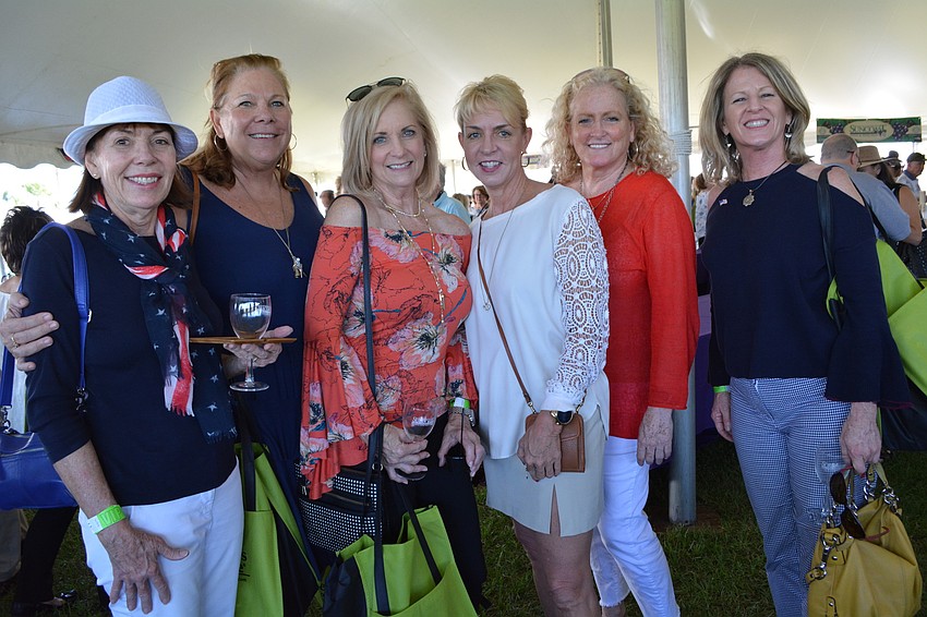 Kathy Goering, Deborah Ericson, Sharyl Smith, Patti Coit, Mary Clarke and Carol Law, of Bradenton, are ready for wine.