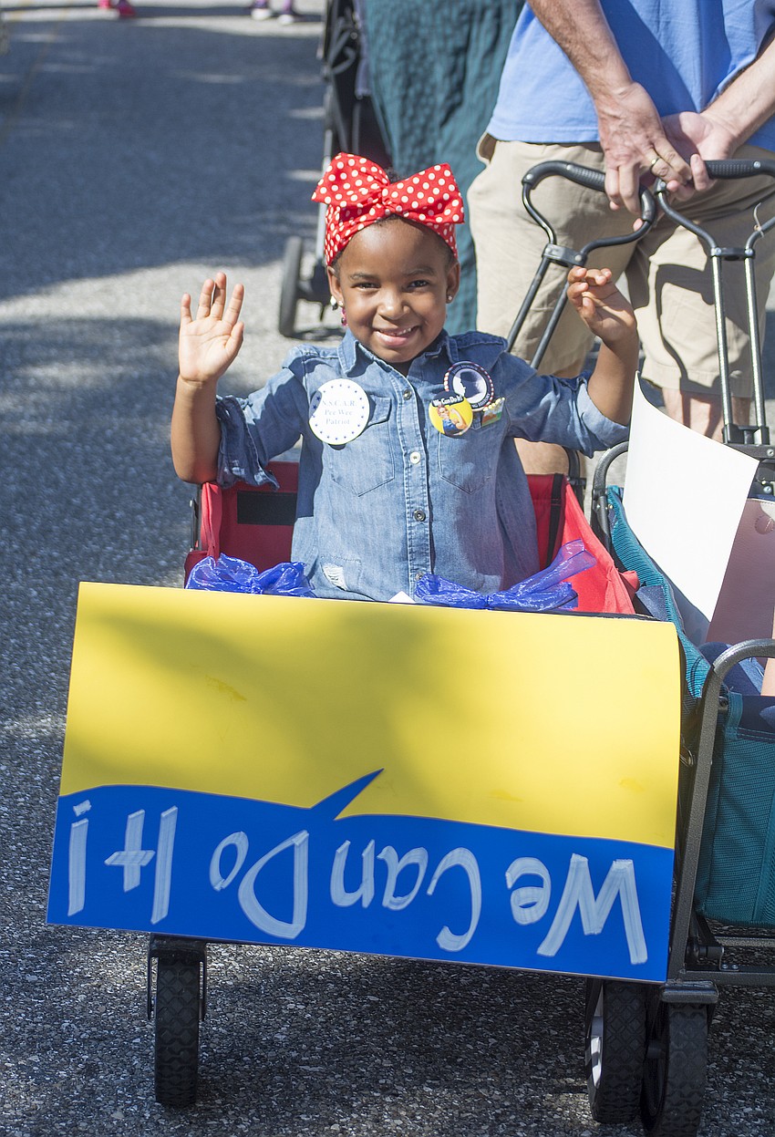 Naomi Abiodun dressed as Rosie the Riveter for Sarasota's Veterans Day Parade. The parade honored Sarasota's female veterans and wartime contributors.