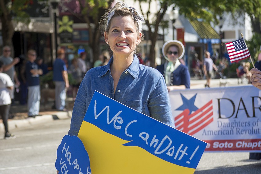 Michelle Rencher dressed as Rosie the Riveter for Sarasota's Veterans Day Parade. The parade honored Sarasota's female veterans and wartime contributors.