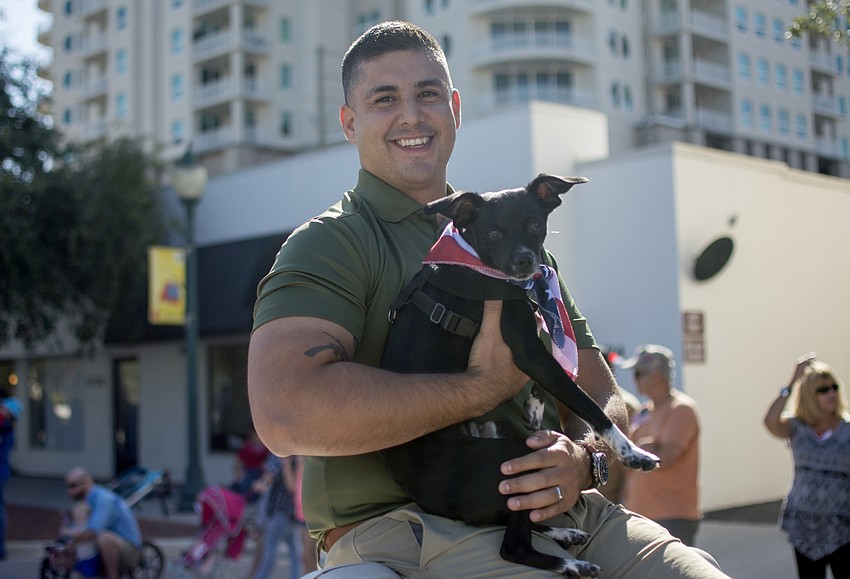 Steven Garcia rides in Sarasota's Veterans Day Parade.