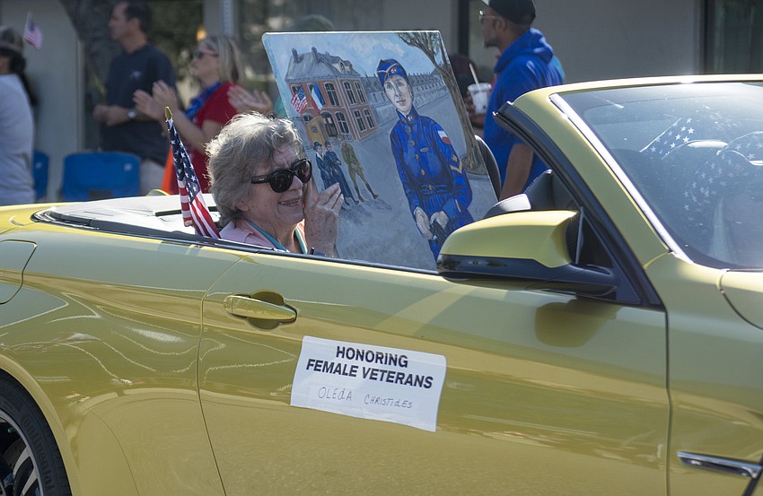 Michelle Christides rides in Sarasota's Veterans Day Parade in honor of her mother, Oleda Christides.