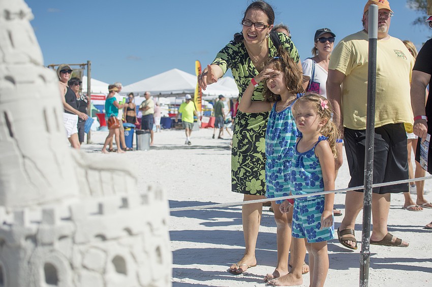 Juliana, Bianca and Victoria Grebing watch as Abram Waterman and Walter MacDonald work on their submission to the 2017 Crystal Classic.