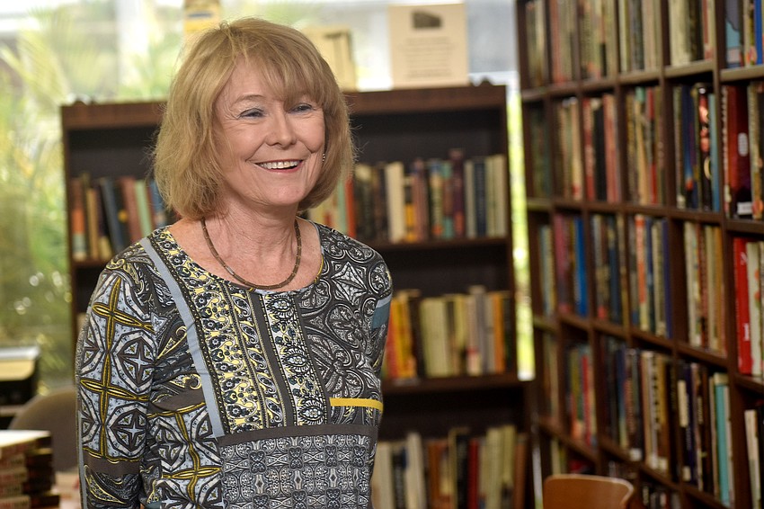 Pat Gussin laughs as she explains her new book, “Come Home,” to readers at the Longboat Library on Nov. 12.