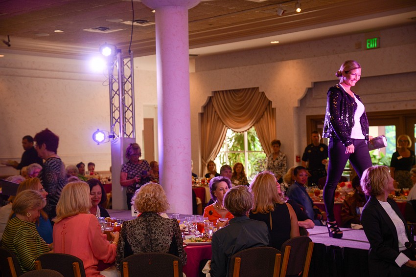 A model walks in the runway show.