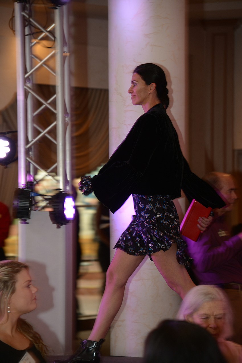 A model walks in the runway show.
