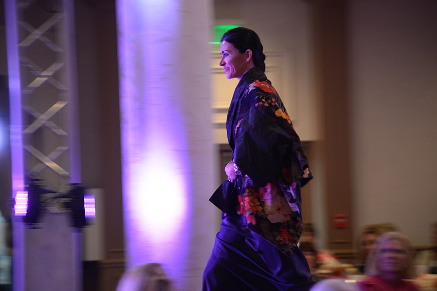 A model walks in the runway show.