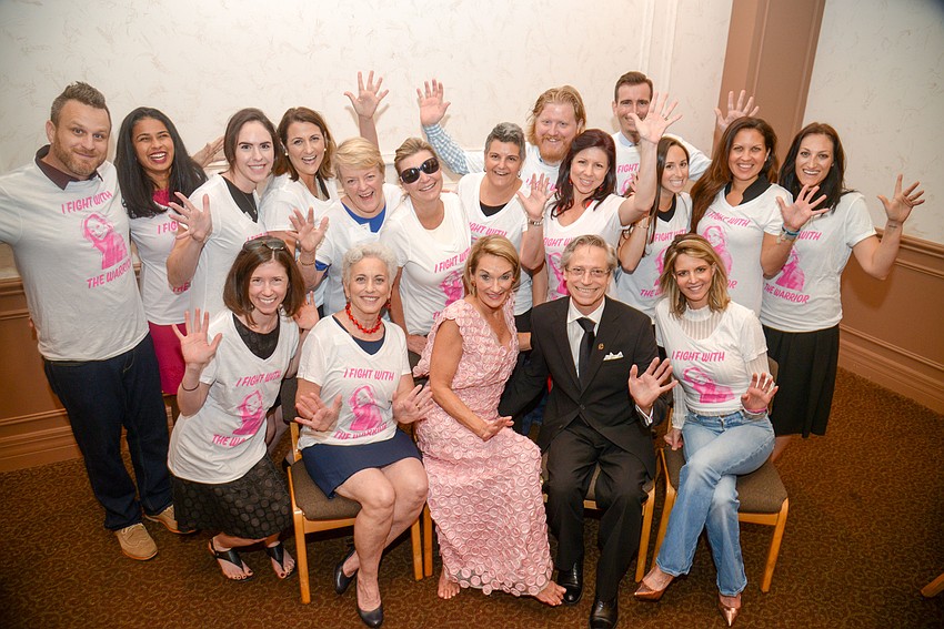 Planned Parenthood staff show their jazz hands.