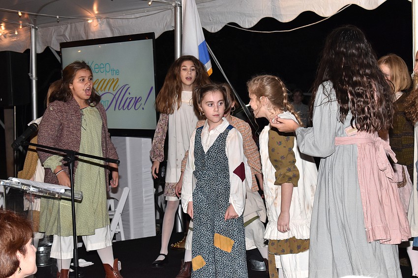 The cast of Manatee Performing Arts Center’s “Annie” performs.