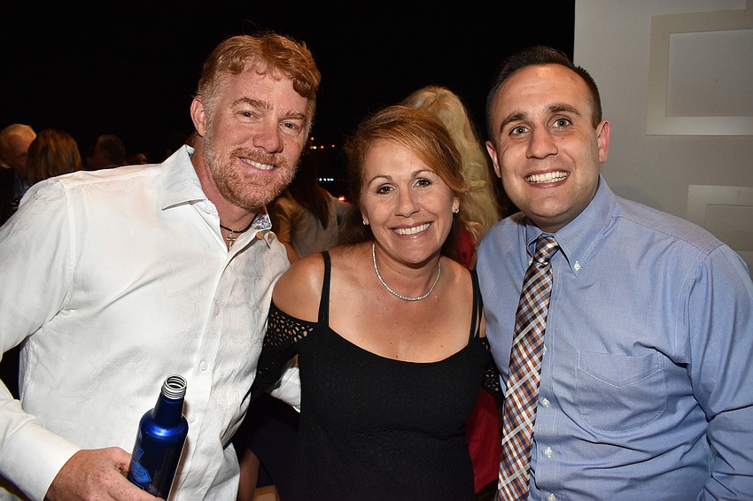 Todd and Chris Martin with Michael Salmon