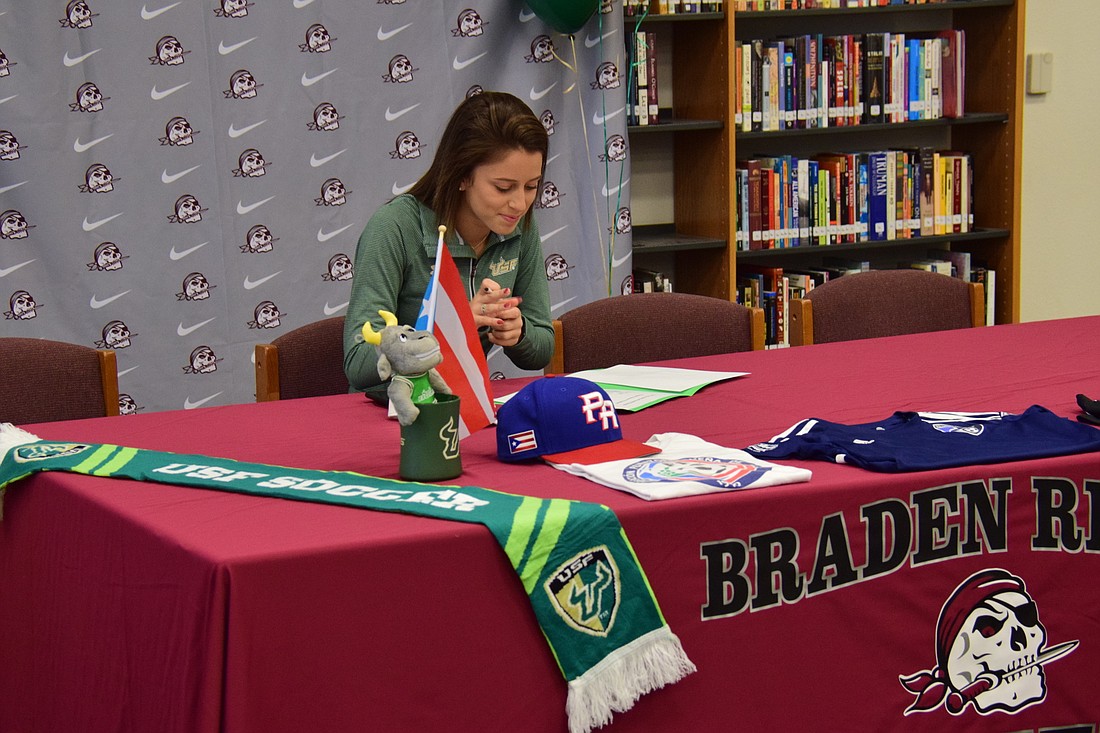 Camie Lizardi signed with the University of South Florida. Photo courtesy Abby Toole-Plummer.