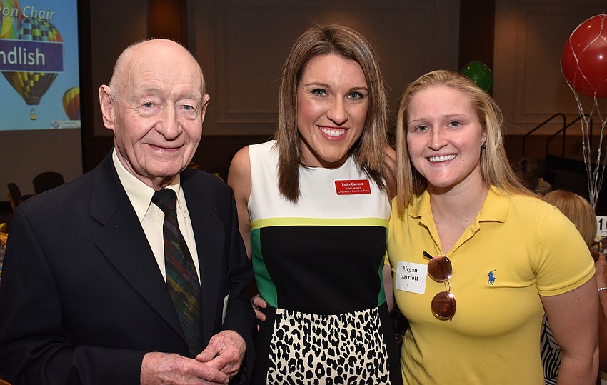 Ian Sharp with Emily and Megan Garriott