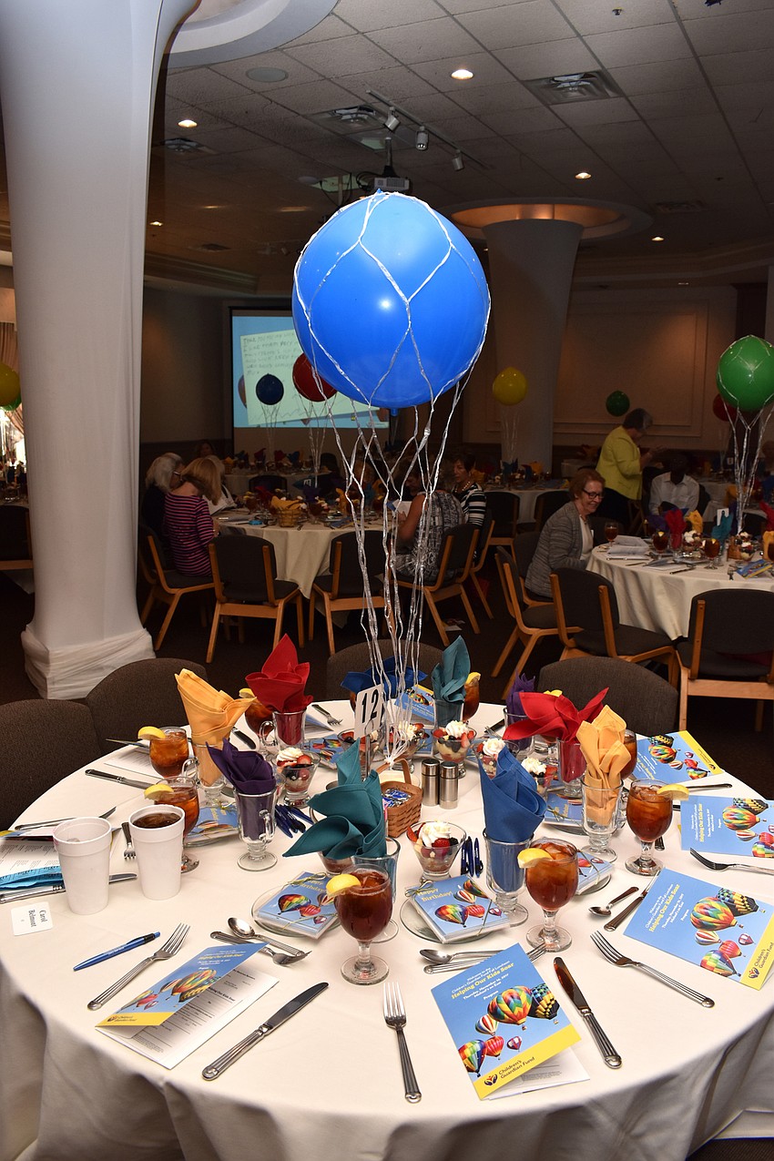 Each table was adorned with a balloon centerpiece.