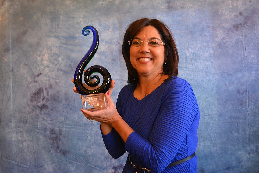 Lori Ruth took down the Sandies award for Bull by the Horns.