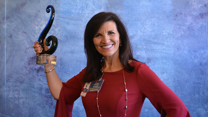 Violeta Huesman of Keiser University took down top honors for Volunteer of the Year.