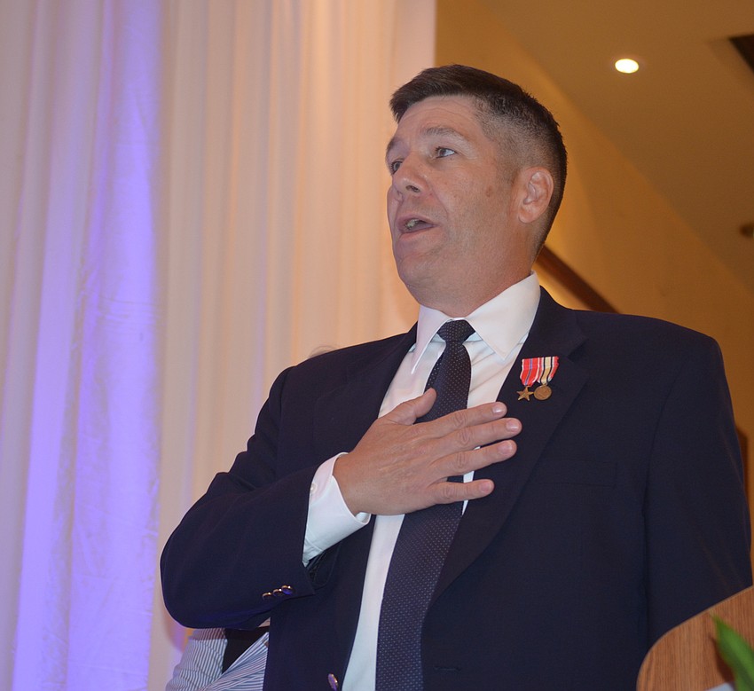 Veteran Eric Onstad led more than 300 attendees in the Pledge of Allegiance.