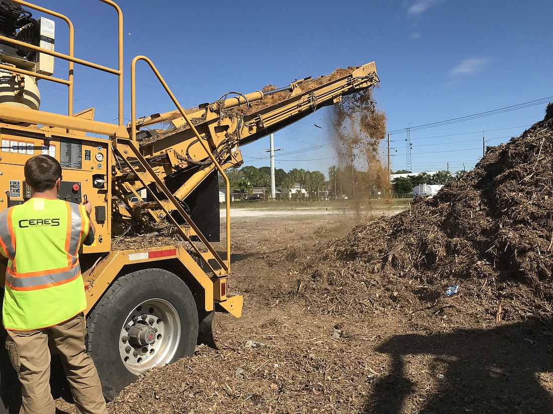 At a site near 12th Street and Orange Avenue, crews are grinding down storm debris for disposal. Photo courtesy city of Sarasota.