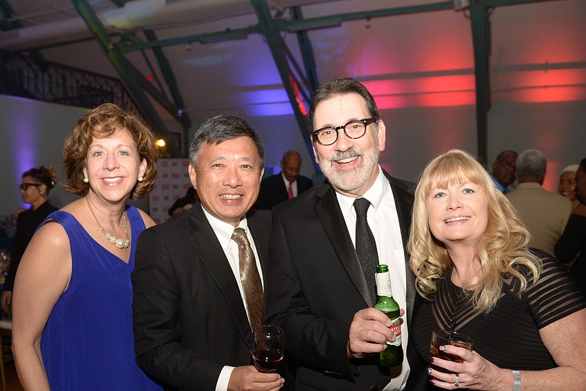 Lorrie and Horace Liang with James and Pam Klein