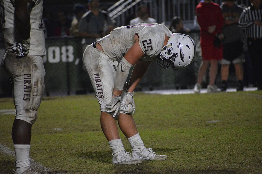 Senior Chase Knopf rests his hands on his knees as the clock ticks toward zero, on both the game and Knopf's Braden River career.