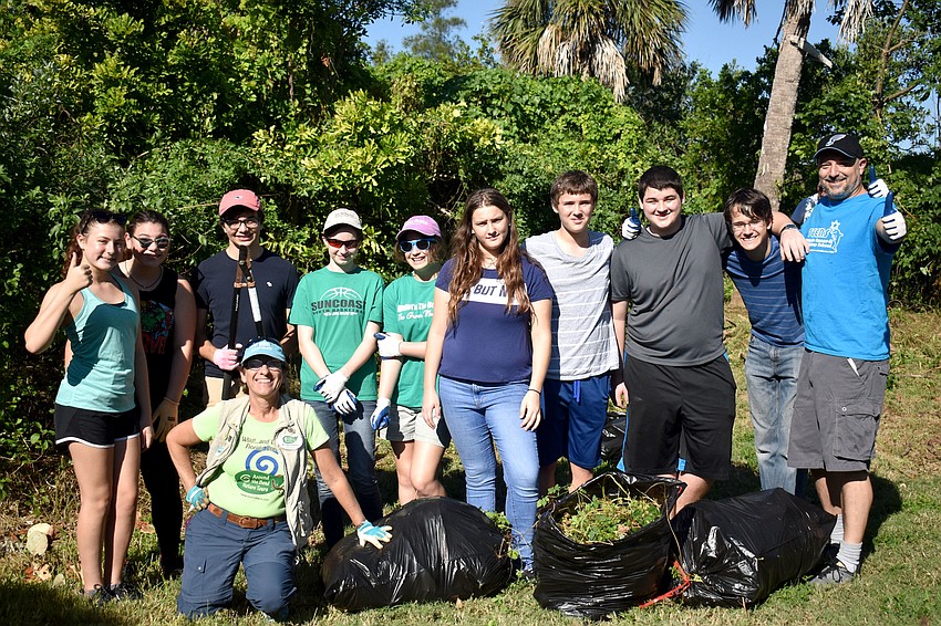 A youth group from Temple Emanu-El joined cleanup efforts on Quick Point Preserve.