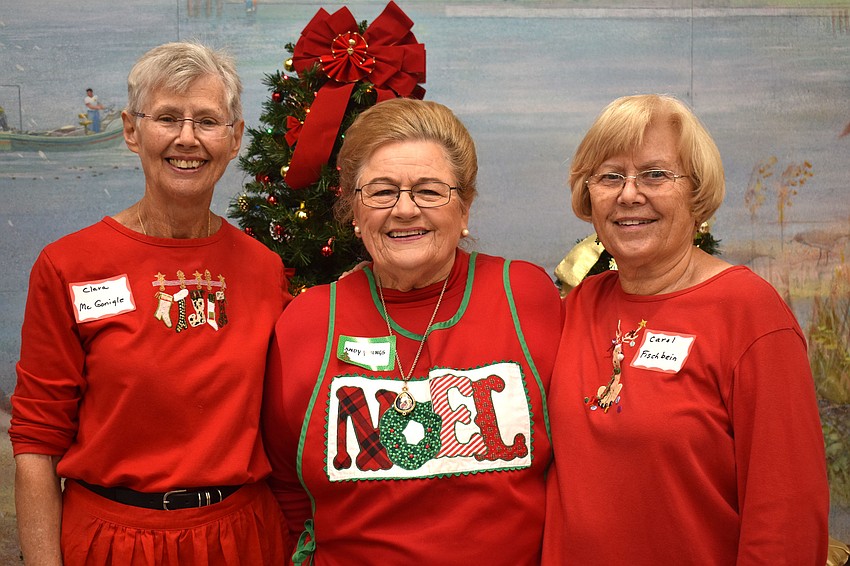 Event chairwomen Clara McGonigle, Andy Youngs and Carol Fischbein