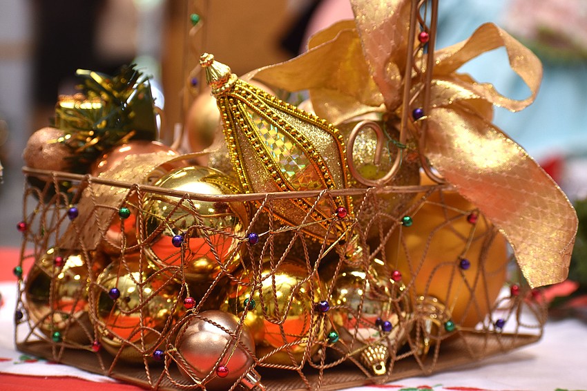 Pins and ornaments were on sale along with Christmas trees, wreaths, jewelry and baked goods.