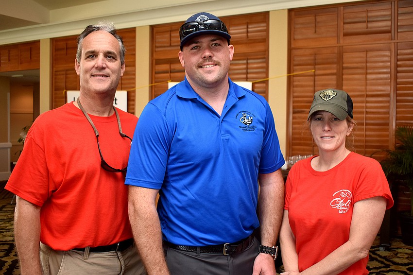 Longboat Key Fire Rescue Chief Paul Dezzi, Longboat Key Firefighters Association President Bryan Carr and Deputy Chief Sandi Drake