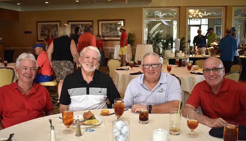 Commissioner Jim Brown, Ken Marsh, Mayor Terry Gans and former mayor Jack Duncan