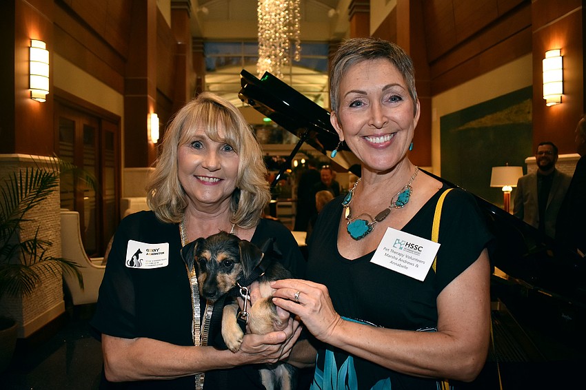 Humane Society Community Outreach Coordinator Ginny Armington and pet therapy volunteer Marsha Andrews with Mimmie, who is available for adoption at the Humane Society.
