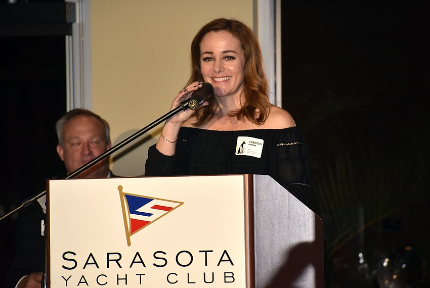 Humane Society Executive Director Christen Benson welcomes guests to the 25th annual Hot Dogs and Cool Cats Gala.