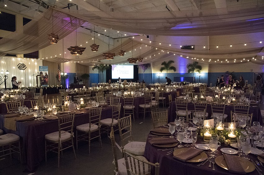 The Lee Wetherington Boys and Girls Club was transformed into an elegant dinner space for Champions for Children.
