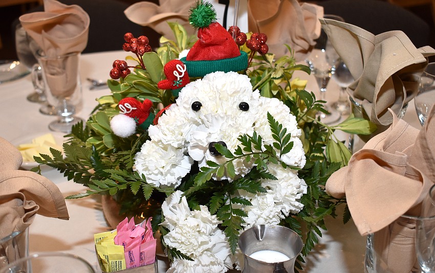 All the poodle-shaped floral centerpieces were made by Barbara Beury.