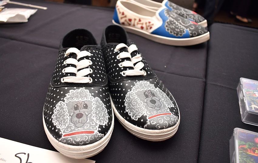 Hand-painted poodle shoes were on sale through the silent auction.