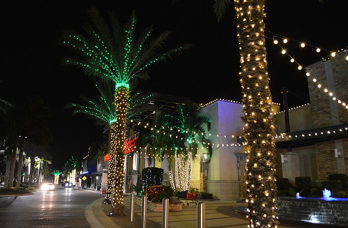 Benderson Development has decorated its shopping plazas in the University Parkway corridor with millions of Christmas lights.