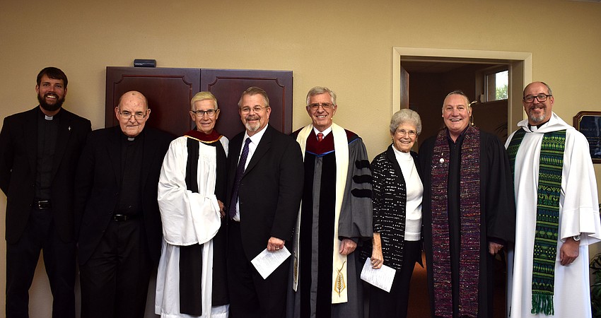The Rev. Eric Scanlan, Monsignor Gerry Finegan, the Rev. David Danner, Rabbi Stephen Sniderman, the Rev. Norm Pritchard, MiMi Horwitz, the Rev. Bill Friederich and the Rev. Kenneth Blyth